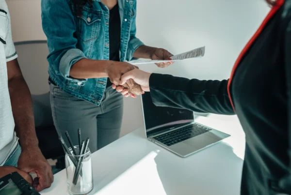 realtor and buyer handshake